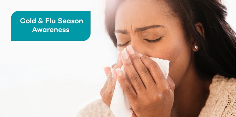 woman blowing nose into tissue